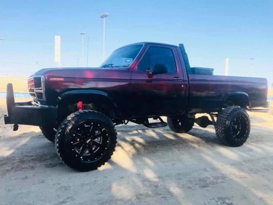 1983 Ford F-250 Candy Red Fading into Black